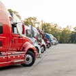 Row Of Trucks Parked In A Lot