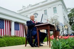 President Donald Trump signs the so-called Liberation Day tariffs on April 2.