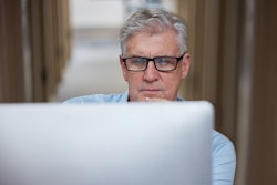 Man Looking At Computer