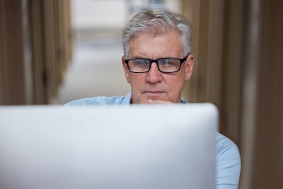Man Looking At Computer