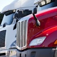 White And Red Trucks In A Lot