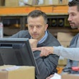 Employees Looking At Computer 62601eba09292