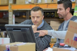 Employees Looking At Computer 62601eba09292