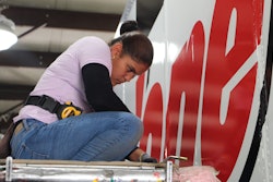 A technician works on a trailer at Stoops Trailers. The dealer, owned by McCoy Group, has 26 locations in the Midwest.