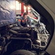 Technician Looking At Truck