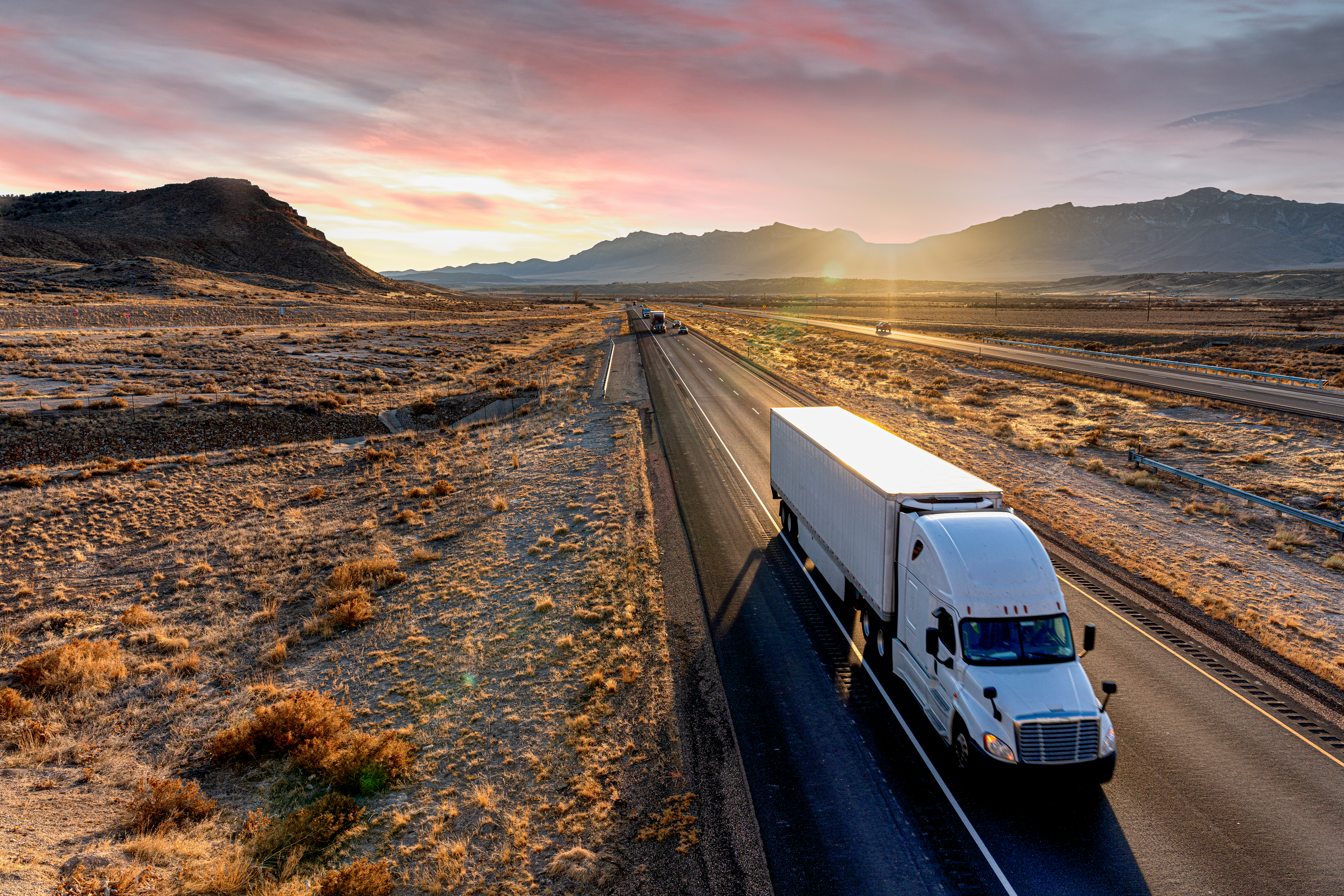Truck Driving Isolated In Desert