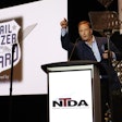 Mark Hall, general manager of Stoops Trailers, accepts the Trailblazer Award on the final night of the National Trailer Dealers Association meeting Oct. 9 in Tucson, Ariz.
