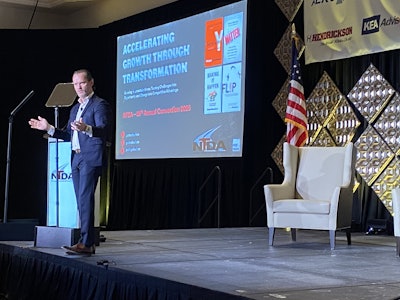 Peter Sheahan discusses growing business during uncertain times during his keynote presentation at the 2025 NTDA Convention Wednesday in Tucson, Ariz.