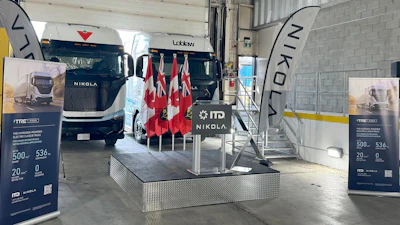 Hydrogen fuel cell and battery-electric semis, built by the now-bankrupt Nikola, parked inside a warehouse in July 2024 to mark the company's entry into the Canadian market.