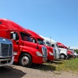 Row Of Trucks In Field