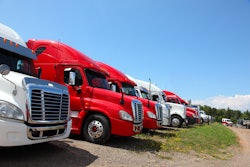 Row Of Trucks In Field