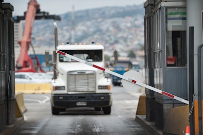 Tariff And Truck Going Through Border