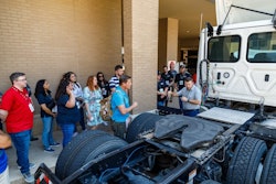 Attendees at Heavy Duty Education Week 2024 in Dallas listen to an instructor detailing vehicle components during a GenFirst course.