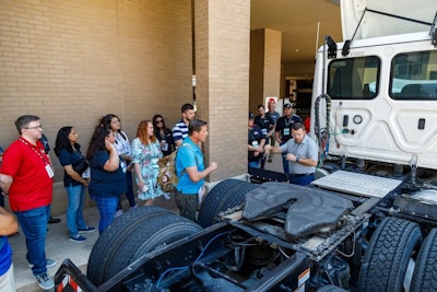 Attendees at Heavy Duty Education Week 2024 in Dallas listen to an instructor detailing vehicle components during a GenFirst course.