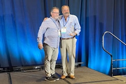 Nick Lombardo (left) presents the Marvin F. Gordon Lifetime Achievement Award to Mark Fishel (right) at the 2025 Used Truck Association (UTA) Convention Thursday in San Diego.