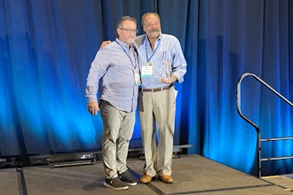Nick Lombardo (left) presents the Marvin F. Gordon Lifetime Achievement Award to Mark Fishel (right) at the 2025 Used Truck Association (UTA) Convention Thursday in San Diego.