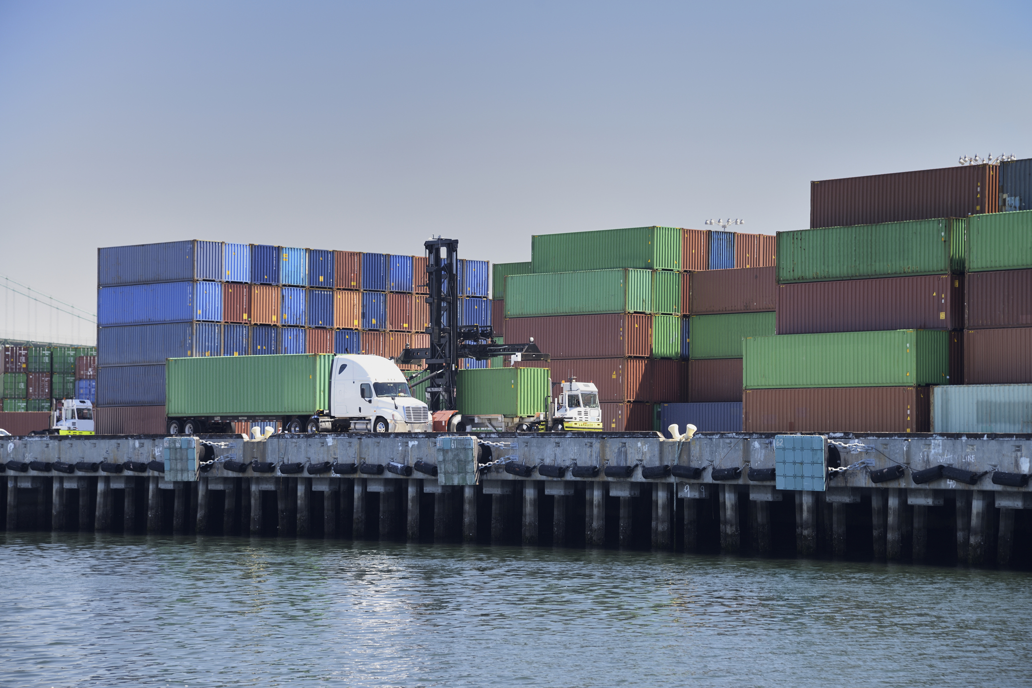 Truck At A Port With A Shipping Container