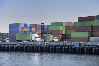 Truck At A Port With A Shipping Container