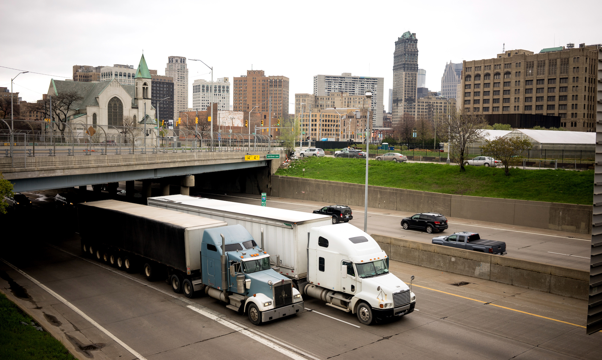 Trucks Driving On Highway Through Detroit
