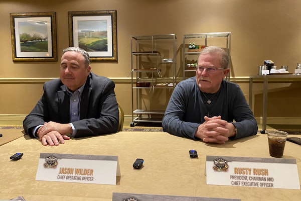 Rush Enterprises executives Jason Wilder, COO, and Rusty Rush, president, chairman and CEO, speak during a press conference Tuesday at the 2025 Rush Tech Skills Rodeo in Nashville.