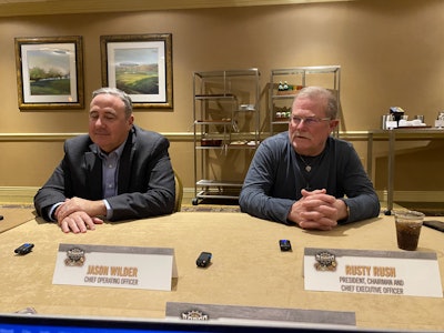 Rush Enterprises executives Jason Wilder, COO, and Rusty Rush, president, chairman and CEO, speak during a press conference Tuesday at the 2025 Rush Tech Skills Rodeo in Nashville.