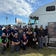 Pinellas Technical College instructors and students pose with a decommissioned truck donated to the diesel technician program by the MITER Foundation.