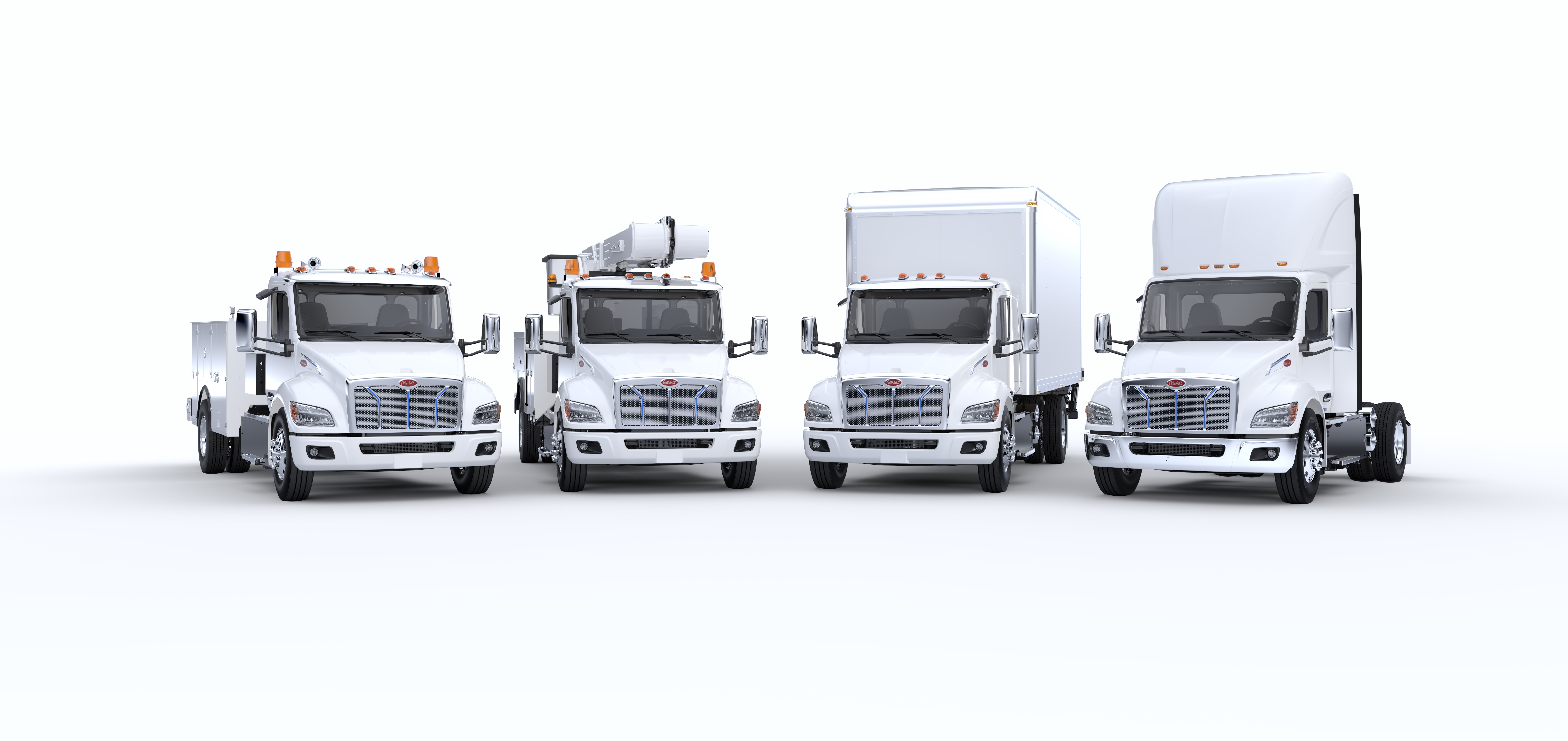 Peterbilt's new medium-duty EV lineup, from left: 536EV, 537EV and 548EV.