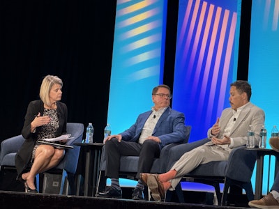 Molly MacKay Zacker, left, moderates a panel on the view from fleet executives at Heavy Duty Aftermarket Dialogue 2026.