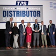Truck Equipment Inc. President Matt Schroeder (center) is presented the 2025 TPS Distributor of the Year during the opening general session at Heavy Duty Aftermarket Week Tuesday in Grapevine, Texas.