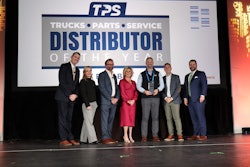 Truck Equipment Inc. President Matt Schroeder (center) is presented the 2025 TPS Distributor of the Year during the opening general session at Heavy Duty Aftermarket Week Tuesday in Grapevine, Texas.