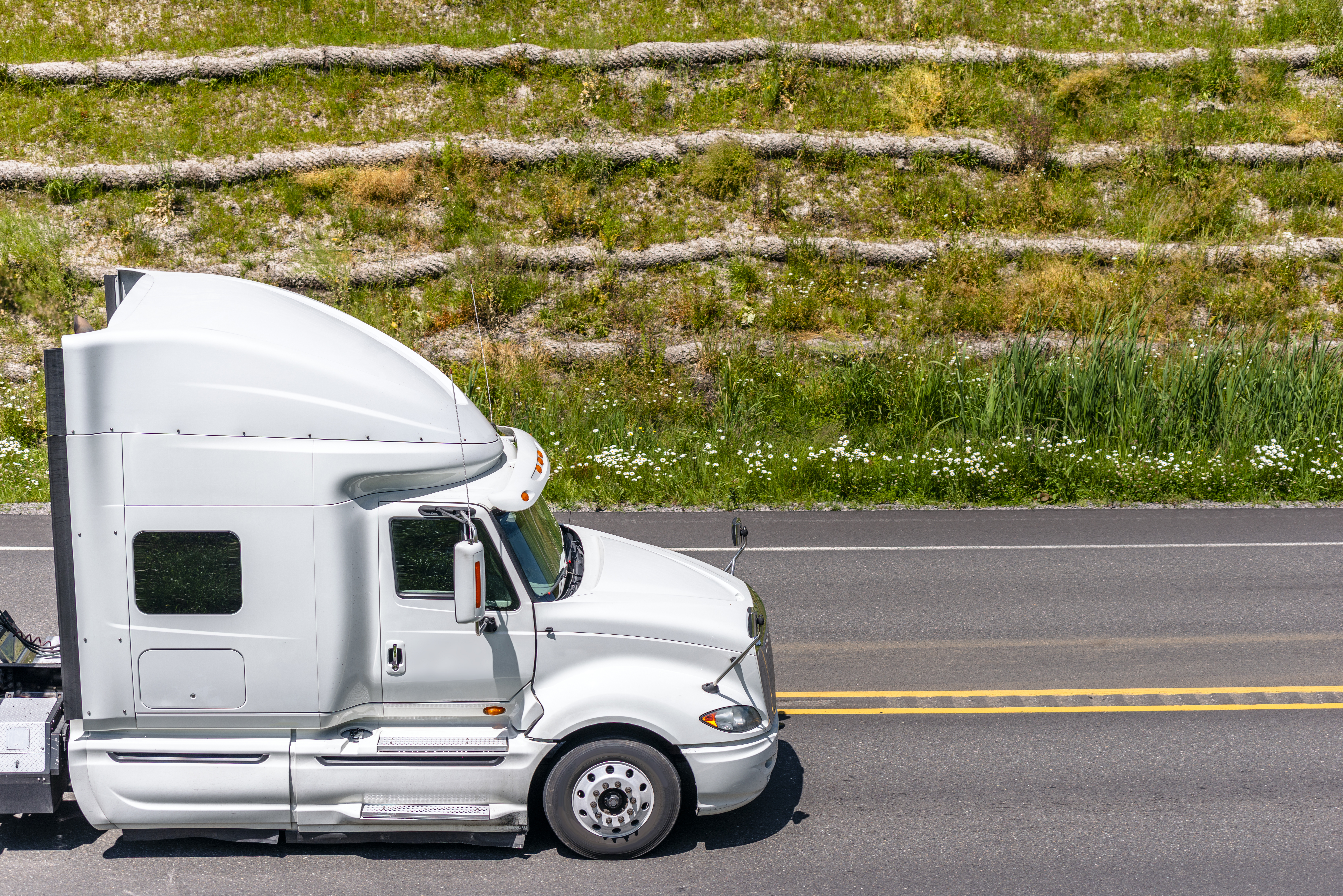 White Truck Going Up Hill
