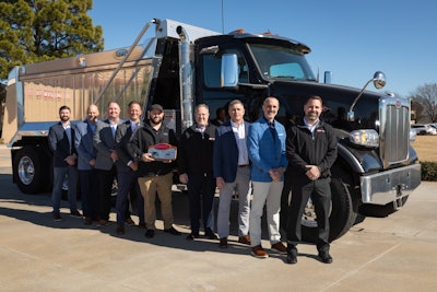 Pictured from left to right: Devin Stuck (Peterbilt) - Dealer Development Manager, Mike Devlin (Ohio Peterbilt) - Service Director, Adam Spinks (Peterbilt) - National Service Development Manager, Danny Landholm (Peterbilt) - Director of Dealer Network Development, Mike Fitzpatrick (Ohio Peterbilt) - Dealer Technical Manager and Peterbilt Master Technician, Ken Taylor (Ohio Peterbilt) – President, Mike Crawford (Ohio Peterbilt) - Vice President, Greg Rempe (Ohio Peterbilt) - Sales Director and James Marshall (Ohio Peterbilt) - Parts Director.