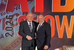 New ATD Chairman Kevin Holmes (left) takes the gavel from prior Chairman Scott Pearson during a general session at the 2026 ATD Show Thursday in Las Vegas.