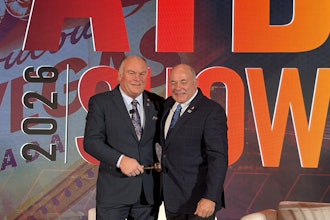 New ATD Chairman Kevin Holmes (left) takes the gavel from prior Chairman Scott Pearson during a general session at the 2026 ATD Show Thursday in Las Vegas.