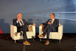 Incoming ATD Chairman Kevin Holmes (left) speaks with Terry Martin of Martin's Peterbilt after the latter was named the 2026 ATD Truck Dealer of the Year Thursday at the ATD Show in Las Vegas.