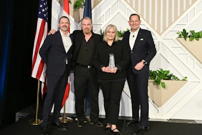 Mid-Ontario Truck Centre accepts the Volvo Trucks North America 2025 Canadian Dealer Group of the Year award.