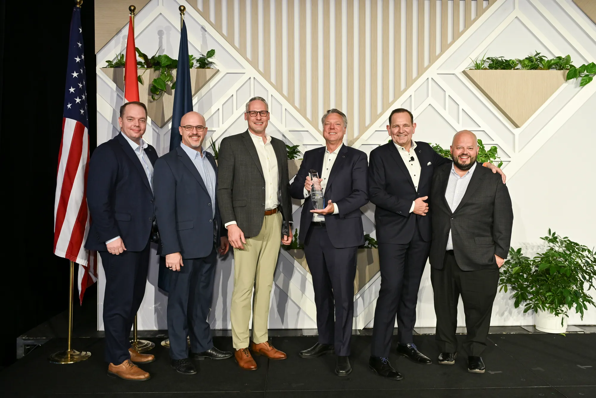 M&K Truck Centers accepts the Volvo Trucks North America 2025 U.S. Dealer Group of the Year award during an awards banquet this week in Las Vegas.