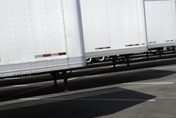 Row Of New White Trailers In Parking Lot