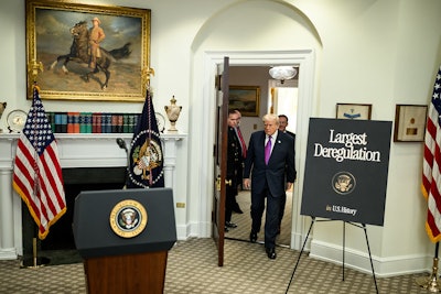 President Donald J. Trump walks in to an announcement of greenhouse gas (GHG) deregulation recently. On Friday, the administration was hit by lower than expected gross domestic product and a Supreme Court ruling striking down some tariffs.