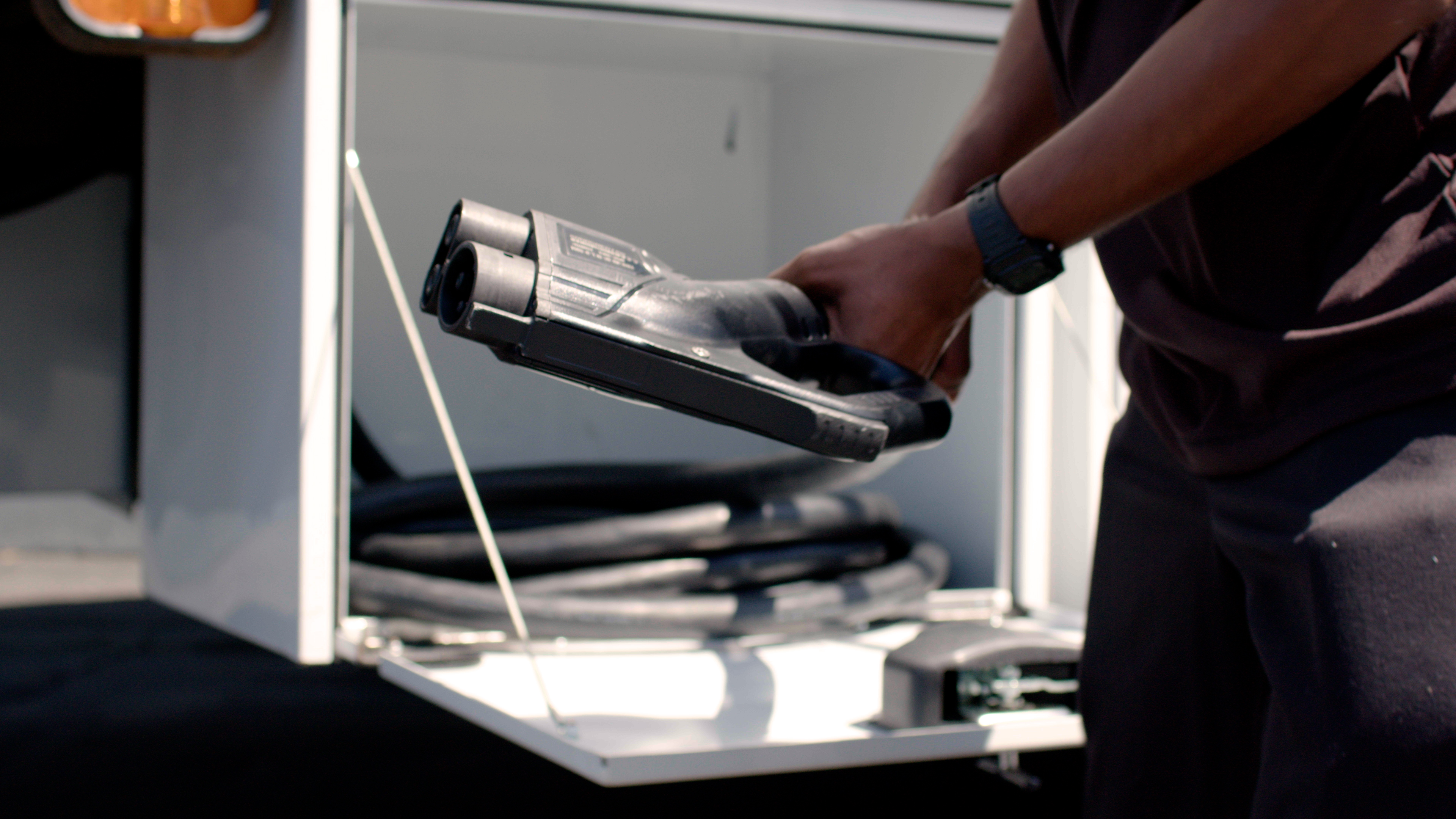 Xos' new vehicle-to-grid (V2G) charger for commercial EV fleets, starting with an electric school bus platform in April 2026.