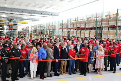 Mississippi Gov. Tate Reeves cuts the ribbon on a $10 million addition to a Hunter Engineering plant in Durant, Miss.