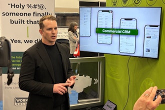 Alex Young, chief product officer at Work Truck Solutions, launches the company's new CRM during Work Truck Week 2026 Wednesday in Indianapolis.