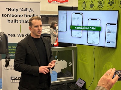 Alex Young, chief product officer at Work Truck Solutions, launches the company's new CRM during Work Truck Week 2026 Wednesday in Indianapolis.
