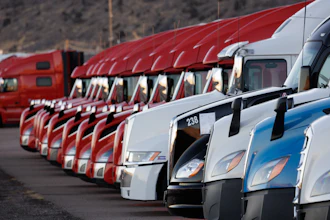 Row Of Red White And Blue Class 8 Trucks