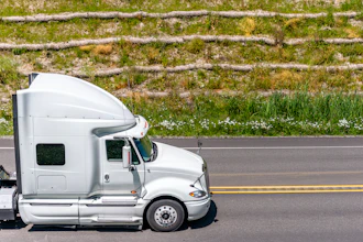 White Truck Going Up Hill
