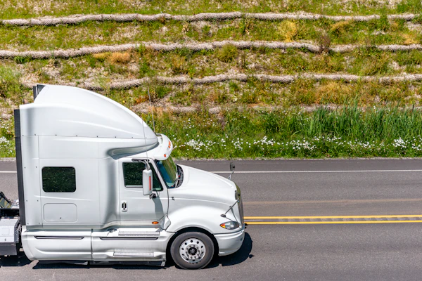 White Truck Going Up Hill