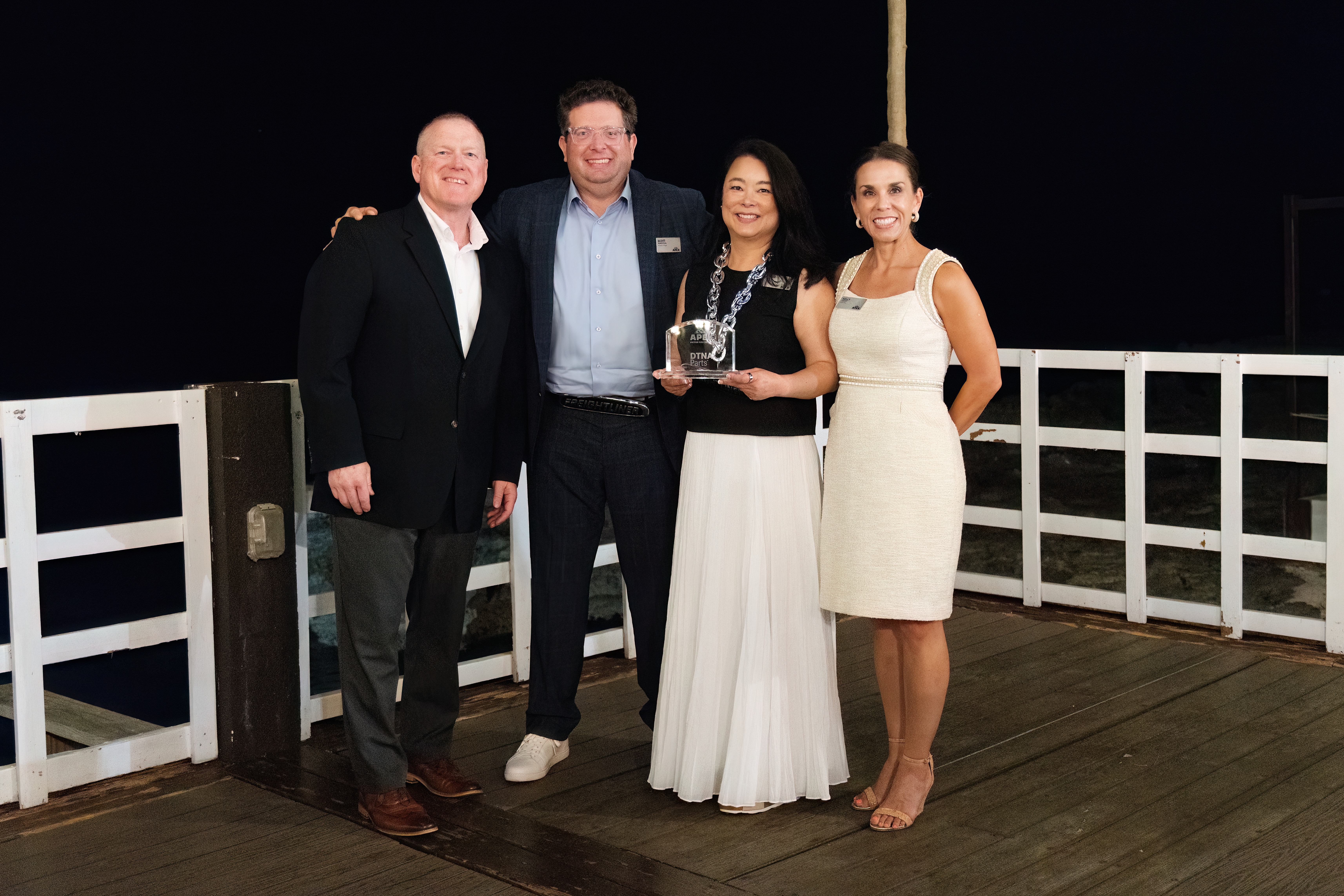 ACC Heavy Duty team members with their APEX Award from Daimler Trucks North America Parts.