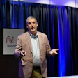 Dean Vicha, president of NationaLease, speaks at the NationaLease Maintenance Managers Meeting where nine member companies are recognized with the Exceptional Service Award.