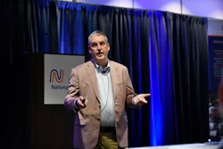 Dean Vicha, president of NationaLease, speaks at the NationaLease Maintenance Managers Meeting where nine member companies are recognized with the Exceptional Service Award.