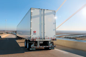 Great Dane Champion Dry Van Crossing Bridge